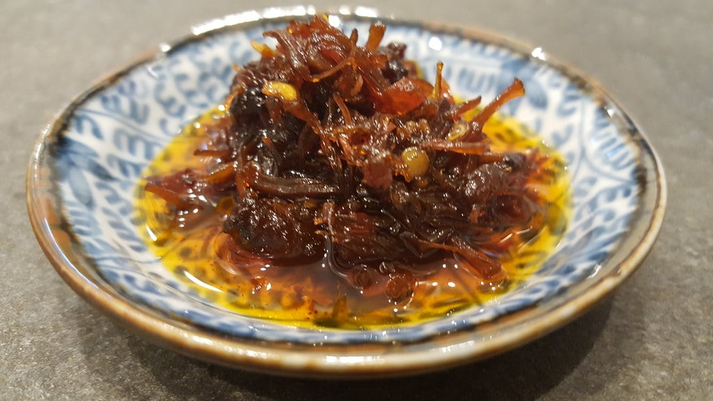 xo sauce has a high consistency and red in color, best served with cured ham, 