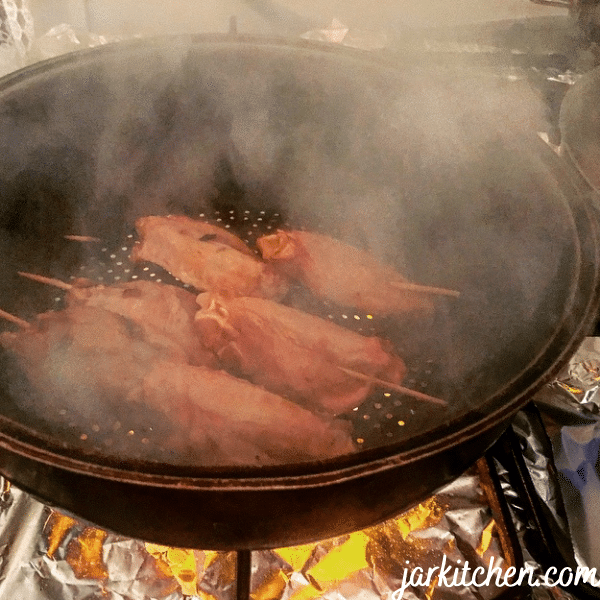 Chicken Wing Bouquet being cooked on a strainer