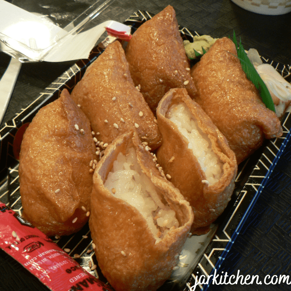 Inarizushi, one of the foods that start with I looks like rice filled dough pockets. 