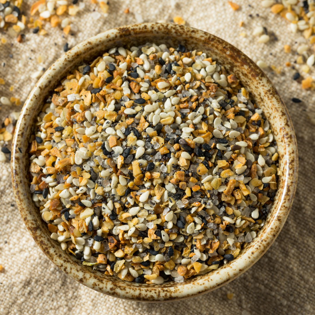 everything bagel seasoning is a mix of sesame seeds, garlic, onion and salt
